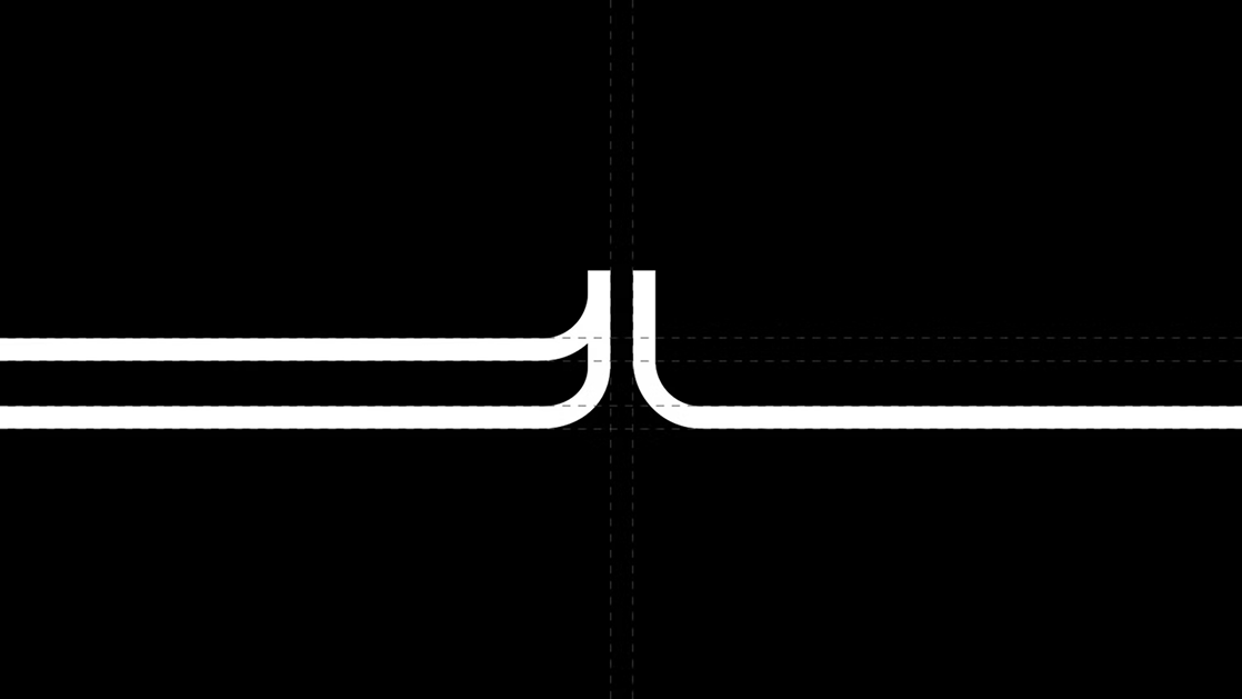 Détail de construction du logotype blanc LAYDOWN sur une grille noire.