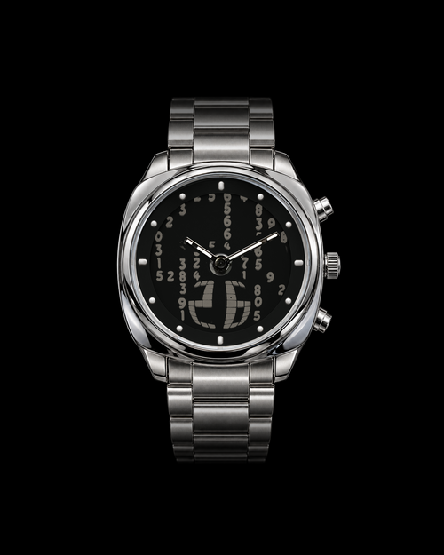 Matrix Signal Carbon watch with moving numbers behind analogue hands